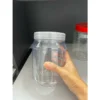 my-11134207-7r990-lntfv5sksosd64.webp Random Plastic Jar with Lid 1500ml L11cm W11cm H17cm